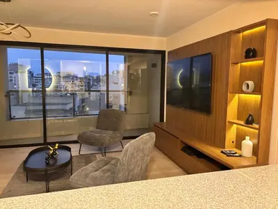 a living room with a view of a city at Apartment in Larco - Miraflores in Lima