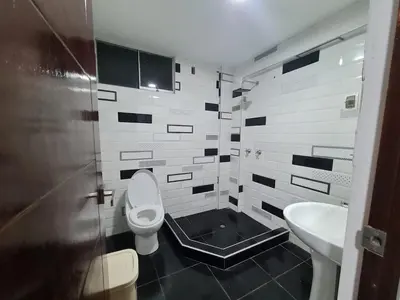 a bathroom with a toilet and a sink at comfortable magic apartment in San Juan Bautista