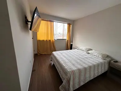 a bedroom with a bed and a window at Mn Depa en San Bartolo in San Bartolo