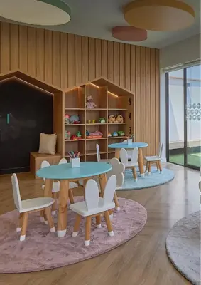 a classroom with two tables and chairs and a chalkboard at Apartment in Lima close to everything in Lima