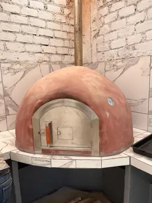 a pizza oven sitting on top of a counter at Departamento 201 in Punta Negra