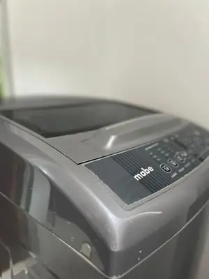 a close up of a toaster oven with a cell phone at Habitación equipada en san juan de Lurigancho in Lima