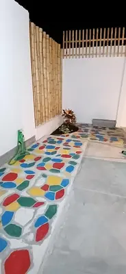a room with a floor covered in colorful tiles at Condominio Vive Paracas in Puerto Nuevo