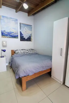 a bedroom with a bed in a room at Mini Apartment Flat in the heart of Cusco - Close to Main Square in Cusco