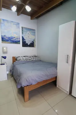 a bedroom with a bed in a room at Mini Apartment Flat in the heart of Cusco - Close to Main Square in Cusco