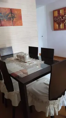 a dining room table with chairs and a bowl on it at EL rincon feliz in San Antonio