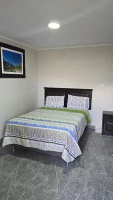 a bedroom with a large bed in a room at Hotel Los Andenes in Cotahuasi