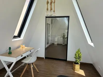 a room with a desk and a chair and a window at Casa Hacienda El Triangulo - Asia del Campo in Asia
