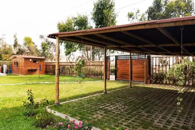 a pavilion in a yard with a fence at Casa Hacienda El Triangulo - Asia del Campo in Asia