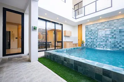 a large swimming pool in a house at Sol de Paracas Beach Homes by Vibrant in Pisco
