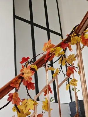 a bunch of autumn leaves on a ladder at UMAY lodge house in Urubamba