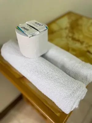 a roll of toilet paper sitting on top of a shelf at HOSPEDAJE VISTA Del SOL PARACAS in Paracas