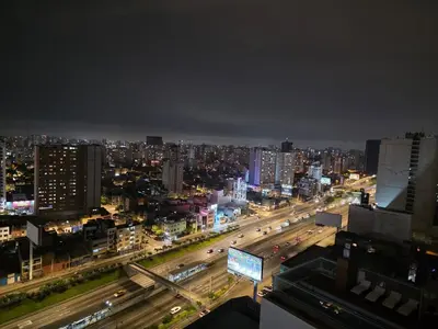 a view of a city at night with traffic at Lujoso departamento y céntrico en Lima in Lima