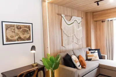 a living room with a couch and a table at 5 stars Stylish Andean Stay - CUSCO in Cusco