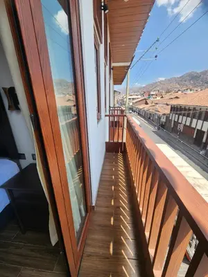 a balcony with a view of a street at Lama Vista Living 302 in Cusco