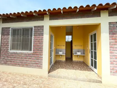 a room with two urinals on the side of a building at Hermosa Casa de Campo en Azpitia in Santa Cruz de Flores