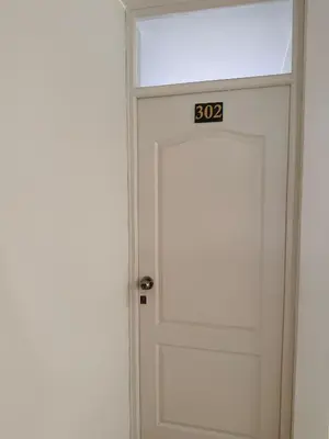 a door with a speed limit sign on it at Huacachina Boutique Hotel in Ica