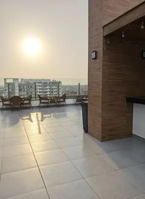 a balcony with tables and benches on a building at Costanera Tourist Free Parking 3B 708 in Lima