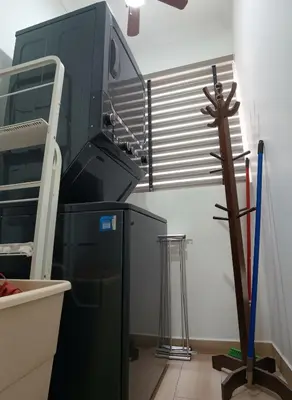a laboratory with a machine and a cross in a room at E SuiteCost FreeParking San Miguel 1B 708 in Lima