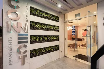 a vertical garden on a wall in a lobby at Peruvian Apartments Barranco 1404 in Lima