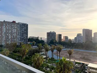 a view of a city with palm trees and buildings at Peruvian Apartments Barranco 1404 in Lima