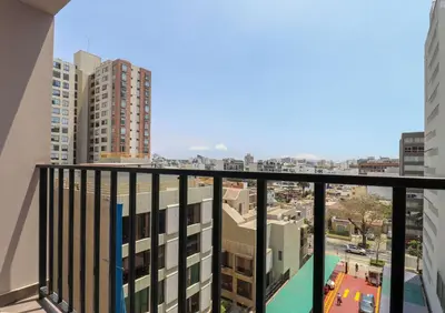 a balcony with a view of a city at Marvelous 2BR with Balcony in Miraflores in Lima