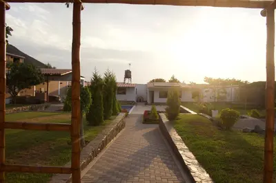 a view of a yard with a house at Casa de Campo Pachacamac in Pachacamac