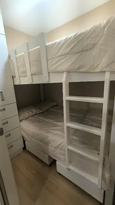 a bunk bed in a room with a bunk bed in a bedroom at Pueblo Libre 501 in Lima