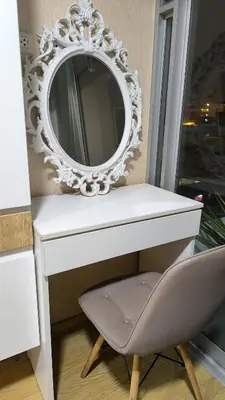a white dressing table with a mirror and a chair at Pueblo Libre 501 in Lima
