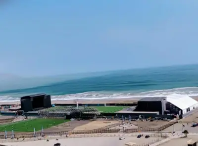a view of a soccer stadium next to the ocean at Costa 21 Frente al Mar San Miguel in Lima