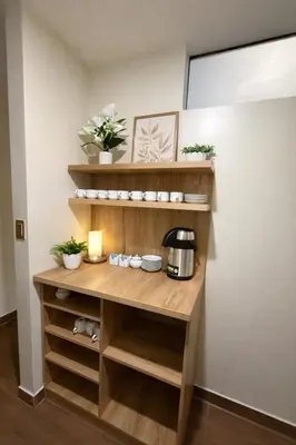 a shelf in a room with a coffee maker on it at Hospedaje chakana inn in Cusco