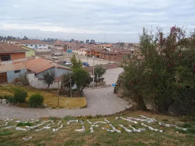 a view of a town with houses and a street at Hospedaje Encanto de Chinchero in Chinchero