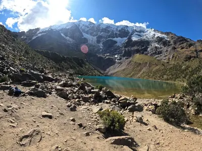 a view of a mountain lake in the mountains at Albergue Salkantay Chawllay in Santa Teresa