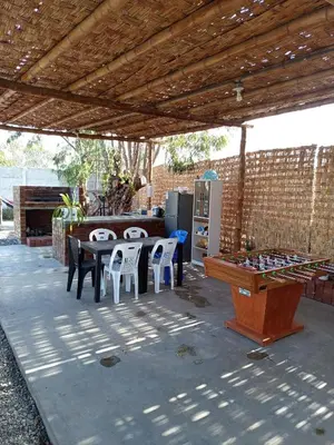 a patio with a ping pong table and a ping pong table at Casa Rústica in Ica