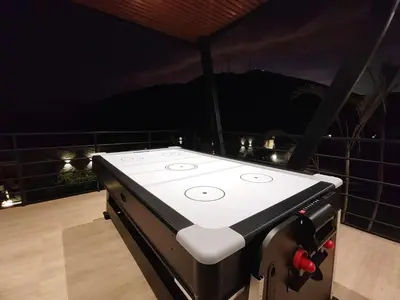 a stove top oven sitting on top of a kitchen at Quiet 4BR Villa with Pool & Terrace in Ica