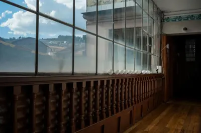 a room with a window with a view of the golden gate bridge at Moty's Guesthouse in Cusco