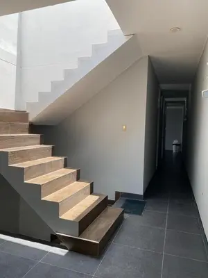 a stairway in a building with a stair case at Ruta del Oasis - Huacachina in Ica