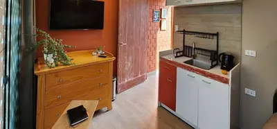 a kitchen with a sink and a counter top at Quiet 3BR Country Villa whit BBQ in Ica