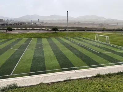 an empty soccer field with a soccer goal at Casa de Playa de Estreno in San Antonio