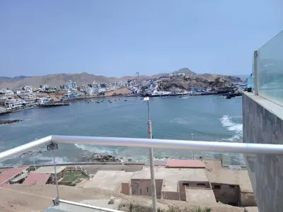 a view of a body of water from a balcony at San bartolo 2 in San Bartolo