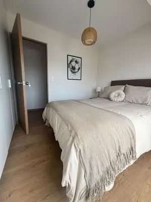 a bedroom with a large white bed in a room at Miraflores Premium in Lima