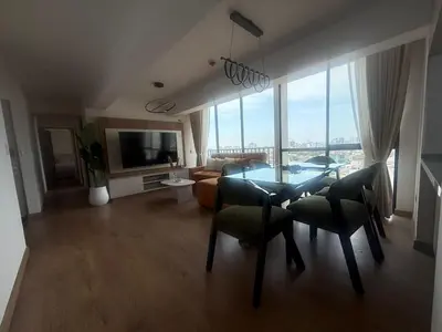 a living room with a table and chairs and a couch at Miraflores Premium in Lima