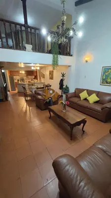 a large living room with couches and a table at Apartamento Plaza de armas de Ayacucho in Ayacucho