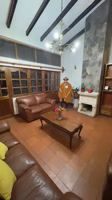 a living room with a couch and a table at Apartamento Plaza de armas de Ayacucho in Ayacucho