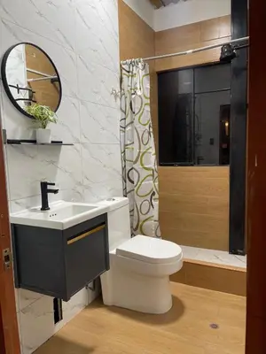 a bathroom with a sink and a toilet and a shower at Casa La Morada Ecolodge in Ayacucho