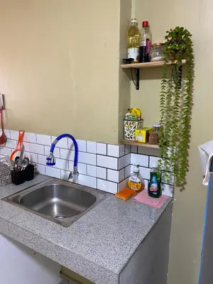 a kitchen with a sink and a counter top at Central 3 minutes from Plaza de Armas by car in Quillabamba