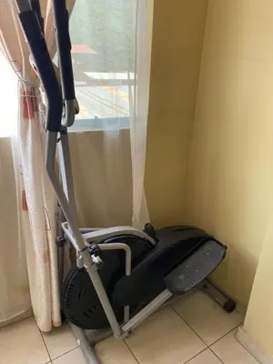 a treadmill sitting in a room next to a window at Central 3 minutes from Plaza de Armas by car in Quillabamba