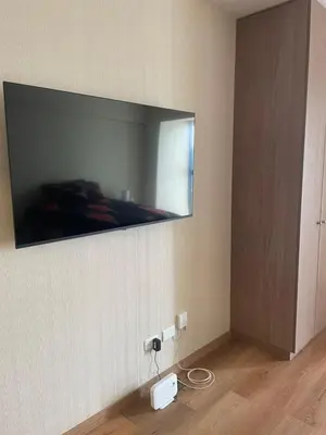a mirror hanging on a wall in a room at Anime-Style Studio Decor in Lima