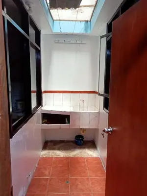 an empty room with a room with a window at Departamento 2 dormitorios 4B in Lima