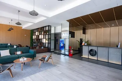 a living room with a couch and a table at All San Isidro Apartments by Vibrant in Lima